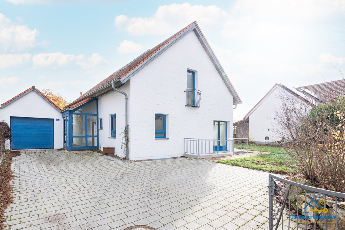 Foto Einfamilienhaus mit Garten und DG-Ausbau