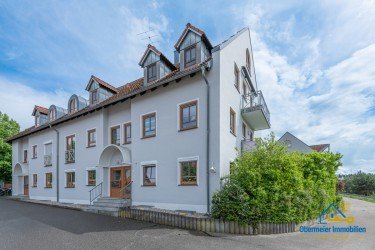 Hauptbild Charmantes Zuhause auf zwei Wohnebenen mit Westbalkon, Gemeinschaftsgarten und Tiefgaragenstellplatz